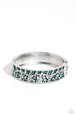 Wavy Whimsy - Blue - and Iridescent Rhinestone Paparazzi Hinge Bracelet