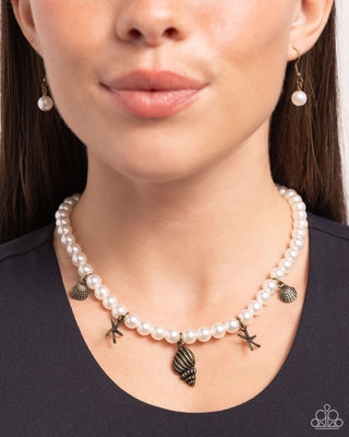 Beachcomber Beauty - Brass - Seashell and Starfish Charm White Pearl Paparazzi Short Necklace