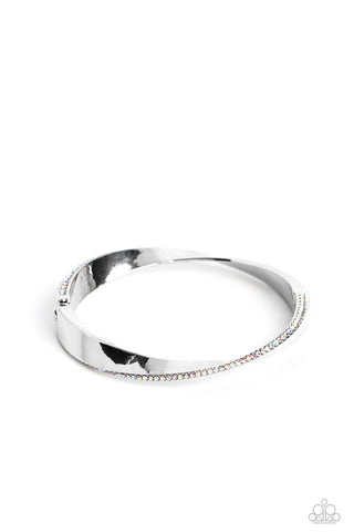 Artistically Adorned - Multi - Warped Iridescent Rhinestone Encrusted Silver Paparazzi Hinge Bracelet