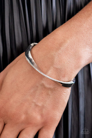 Artistically Adorned - White - Warped Rhinestone Encrusted Silver Paparazzi Hinge Bracelet
