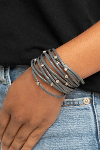 Fearlessly Layered - Silver - White Rhinestone Studded Gray Leather Paparazzi Magnetic Bracelet